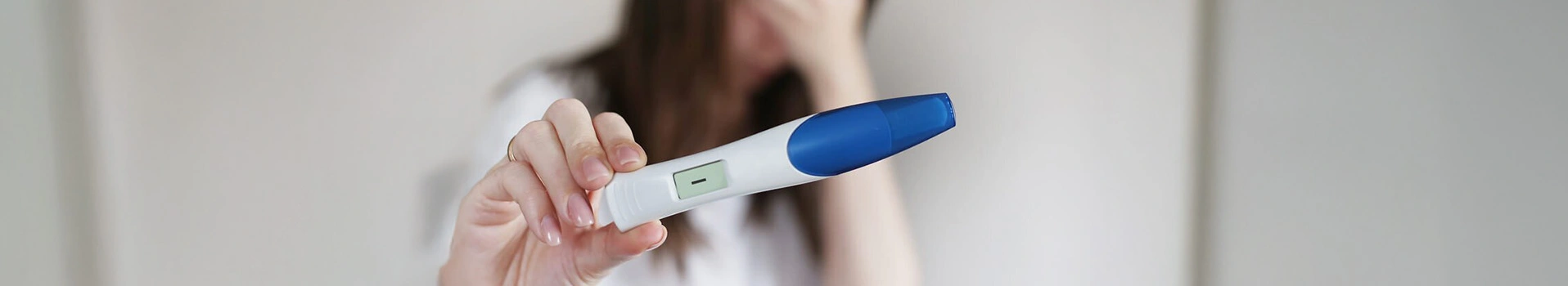 Couple consulting fertility specialist after failed IVF.